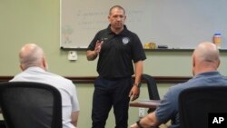 Christopher Day, a U.S. Border Patrol instructor and chaplain, directs a session at the Border Patrol Chaplain Academy on Nov. 20, 2024, in Dania Beach, Florida.