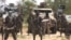 FILE - A screengrab of a video released by the extremist group Boko Haram and obtained by AFP shows group leader Abubakar Shekau. He has described the international response to the coronavirus pandemic as part of a global war on Islam.