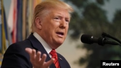 Presiden AS Donald Trump menyampaikan pernyataan di Gedung Putih, Washington, D.C terkait tewasnya pemimpin ISIS Abu Bakr al-Baghdadi di Suriah, 27 Oktober 2019. (Foto: dok).