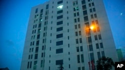 The building housing “Unit 61398” of the People’s Liberation Army is seen in the outskirts of Shanghai, February 19, 2013. 