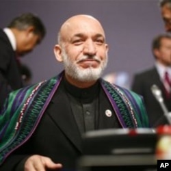 Afghan President Hamid Karzai at the Nato summit in Lisbon, Portugal, 20 Nov 2010