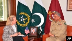 Alice Wells, U.S. deputy assistant secretary of state, meets with Pakistani army chief Gen. Qamar Javed Bajwa to discuss how to ensure peace in Afghanistan following a recent cease-fire between the Taliban and Kabul, in Rawalpindi, Pakistan, July 3, 2018.