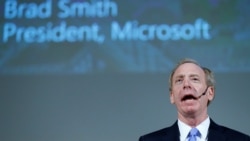 FILE - Brad Smith of Microsoft takes part in a panel discussion "Cyber, big data and new technologies. Current Internet Governance Challenges: What's Next?" at the United Nations in Geneva, Nov. 9, 2017.