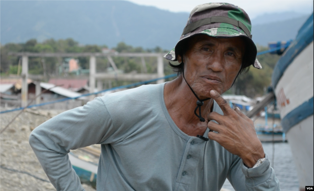 Macario Sepulveda, captain of the Prince John Paul fishing vessel, says his ship does do not go closer than a 55-kilometer radius from the Scarborough Shoal, March 24, 2014. (Simone Orendain/VOA)