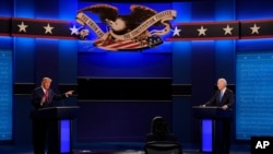 President Donald Trump points towards Democratic presidential candidate former Vice President Joe Biden during the second and final presidential debate Oct. 22, 2020, at Belmont University in Nashville, Tenn. (AP)