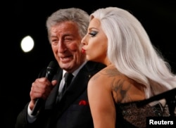 FILE - Lady Gaga performs "Cheek to Cheek" with Tony Bennett at the 57th annual Grammy Awards in Los Angeles, California, Feb. 8, 2015.