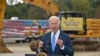 Biden Advocates Spending Plans Amid Uncertainty 