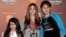FILE - This Jan. 27, 2012 file photo shows, from left, Blanket Jackson, Paris Jackson, and Prince Michael Jackson at the opening night of the Michael Jackson The Immortal World Tour in Los Angeles.