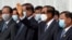 Cambodia's Prime Minister Hun Sen waves during King Norodom Sihamoni's departure to China for a health check-up at Phnom Penh International Airport in Phnom Penh on October 6, 2020. (Photo by TANG CHHIN Sothy/AFP)