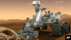 This artist&#39;s rendering provided by NASA shows the Curiosity rover on the surface of Mars. (AP/NASA)