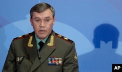 FILE - In this May 23, 2013 file photo Gen. Valery Gerasimov, the chief of the Russian military's General Staff, speaks during a security conference in Moscow.