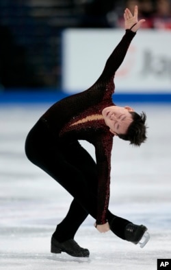 FILE - Denis Ten, of Kazakhstan, skates his free program at the World figure skating championships in Helsinki, Finland, on Apr. 1, 2017.