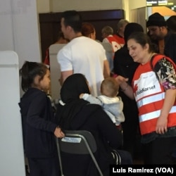 Swedish volunteer medics help migrants at Stockholm Central Station railway, Sept. 21, 2015.