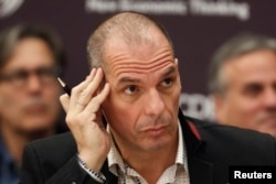 File - Greek Finance Minister Yanis Varoufakis attends a conference at OECD headquarters in Paris, April 9, 2015.