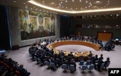 FILE - Members of the United Nations Security Council gather for a meeting on North Korea, Sept. 27, 2018, at the United Nations in New York.