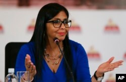 FILE - Delcy Rodriguez, then-president of the Constitutional Assembly, Aug. 28, 2017, gives a press conference in Caracas.