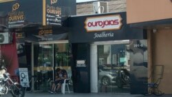 FILE - Gold stores line a street in Boa Vista, Brazil, Wednesday, Nov. 3, 2021.