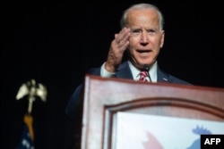 FILE - Joe Biden speaks during the First State Democratic Dinner in Dover, Del., March 16, 2019.