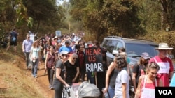 Participants prepare to march in Nairobi's Karura forest during the Women's March, Kenya. January 21, 2017. (J.Craig/VOA)
