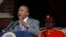 FILE - Kenya President Uhuru Kenyatta delivers a speech during Mashujaa Day -- also known as Heroes Day -- at the Nyayo Nationa Stadium, in Nairobi, Kenya, Oct. 20, 2014. 