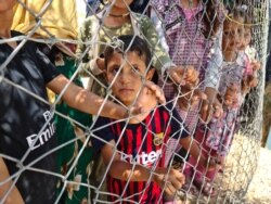 Aid groups say roughly 2 million to 3 million people remain displaced in Iraq, and as the country moves to close camps, many have nowhere to go. July 25, 2020, in Hassan Sham, Iraq. (Halan Akoiy/VOA)