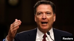 Former FBI Director James Comey testifies before a Senate Intelligence Committee hearing on Russia's alleged interference in the 2016 U.S. presidential election on Capitol Hill in Washington, June 8, 2017. 