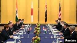 Australia's Foreign Minister Marise Payne, U.S. Secretary of State Mike Pompeo, Japan's Foreign Minister Toshimitsu Motegi and Indian Foreign Minister Subrahmanyam Jaishankar attend the Quad meeting in Tokyo, Japan, Oct. 6, 2020.