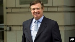FILE - Paul Manafort, President Donald Trump's former campaign chairman, leaves U.S. District Court after a hearing in Washington, May 23, 2018.