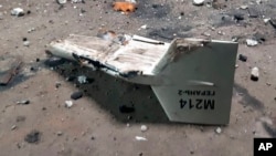 FILE - This undated photograph released by the Ukrainian military's Strategic Communications Directorate shows the wreckage of what Kyiv has described as an Iranian Shahed drone downed near Kupiansk, Ukraine.