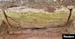 FILE - A view shows a part of an engraved stone after archaeologists from Mexico's National Institute of Anthropology and History (INAH) discovered an ancient Mayan city inside the Balamku ecological reserve in Campeche state, Mexico. (Mexico's National Institute of Anthropology and History/Handout via REUTERS)