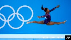Simone Biles, of United States, performs her floor exercise routi 