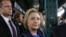 Democratic presidential candidate Hillary Clinton waits for a subway train at the 161St - Yankee Stadium stop in the Bronx borough of New York, April 7, 2016. 