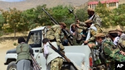 Borci odani Ahmadu Masudu tokom vježbe u provinciji Panšir, sjeveroistočni Afganistan, 30. august 2021.