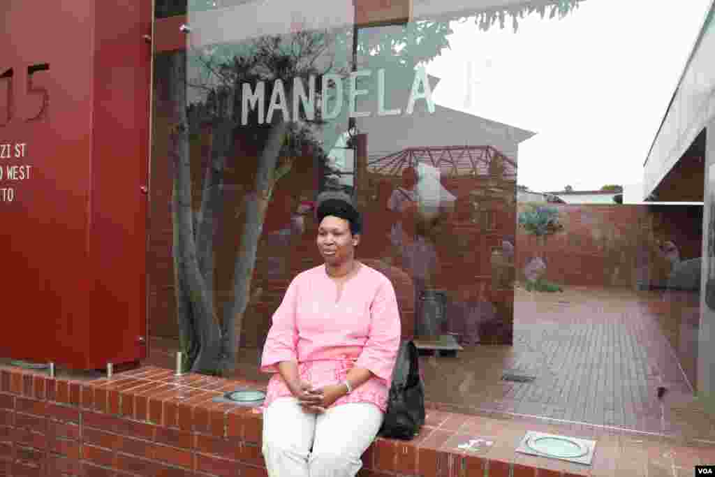Tourists have been visiting or posing by Mandela's house in Soweto, South Africa. (Hannah McNeish for VOA)