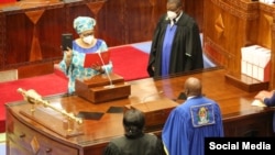 The Speaker of the National Assembly, Job Ndugai, swears in Stergomena Tax as a member of Tanzania's parliament, Sept. 10, 2021. Tax was subsequently appointed defense minister. (Twitter @Hakingowi) 