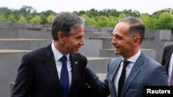 U.S. Secretary of State Blinken and German Foreign Minister Heiko Maas speak as they visit Holocaust Memorial in Berlin, Germany, June 24, 2021. 