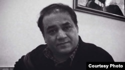 被捕前七天的伊力哈木.土赫提。 (王力雄攝)