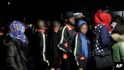 FILE - Hundreds of Nigerians arrived in Lagos, having been repatriated from Libya by the African Union (AU) amid outrage over recent footage that showed migrants being auctioned off as slaves, Dec. 2017. 