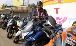 Demaris Mainis, an internet tech security analyst, rides because ‘it’s a way to set yourself free.’ (Photo: A. Wangwa/VOA)