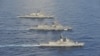 Tiga kapal perang AS, Jepang, dan Australia ketika melakukan latihan militer bersama di Laut China Selatan bulan Oktober tahun lalu (foto: ilustrasi). 