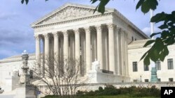 FILE - The Supreme Court in Washington. The court ruled, June 14, 2018, that U.S. courts do not have to accept as conclusive foreign governments’ explanations of their own laws.