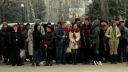 Ukrainian City Honors Rocket Attack Victims as Shaky Cease-Fire Comes Into Effect