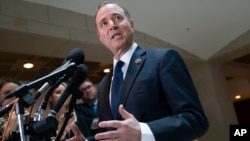 FILE - House Intelligence Committee Chairman Adam Schiff, D-Calif., speaks with reporters on Capitol Hill in Washington, Feb. 6, 2019.