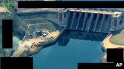 This photo released on March 27, 2017, by the official Twitter account of Operation Inherent Resolve, shows the Tabqa Dam, in Raqqa, Syria.