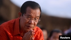 Cambodia's Prime Minister Hun Sen attends a ceremony at the Angkor Wat temple to pray for peace and stability in Cambodia, Dec. 3, 2017.