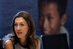 Eva Millona, of the Massachusetts Immigrant and Refugee Advocacy Coalition, participates in a roundtable discussion, Oct. 1, 2019, in Boston, on the impact of a cap on refugee admissions to the U.S.