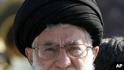 Iran's Supreme Leader Ayatollah Ali Khamenei looks on as he attends the Iranian army land force academy graduating ceremony in Tehran, November 10, 2011.