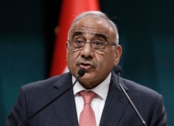 FILE - Iraqi Prime Minister Adel Abdul Mahdi speaks to the media during a joint news conference with Turkish President Recep Tayyip Erdogan, in Ankara, Turkey, May 15, 2019.