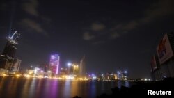 FILE - New buildings are seen along the Saigon river in southern Ho Chi Minh City (formerly Saigon City), Vietnam, April 26, 2015.