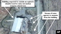 April 9, 2012 photo provided by the Institute for Science and International Security, shows suspected cleanup activities at a building alleged to contain a high explosive chamber used for nuclear weapon related tests in the Parchin military complex in Ira